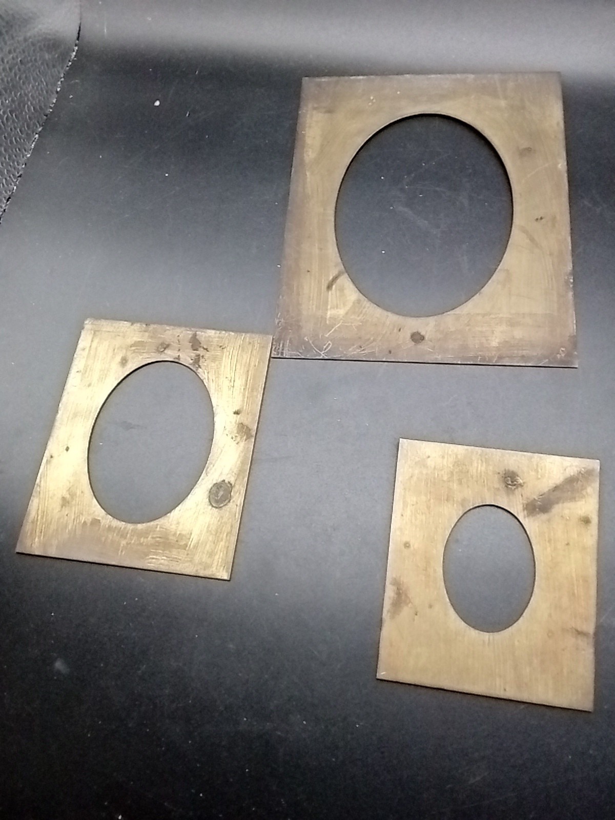 A Lot Of Three Brass Photo Masking Mats With An Oval Opening