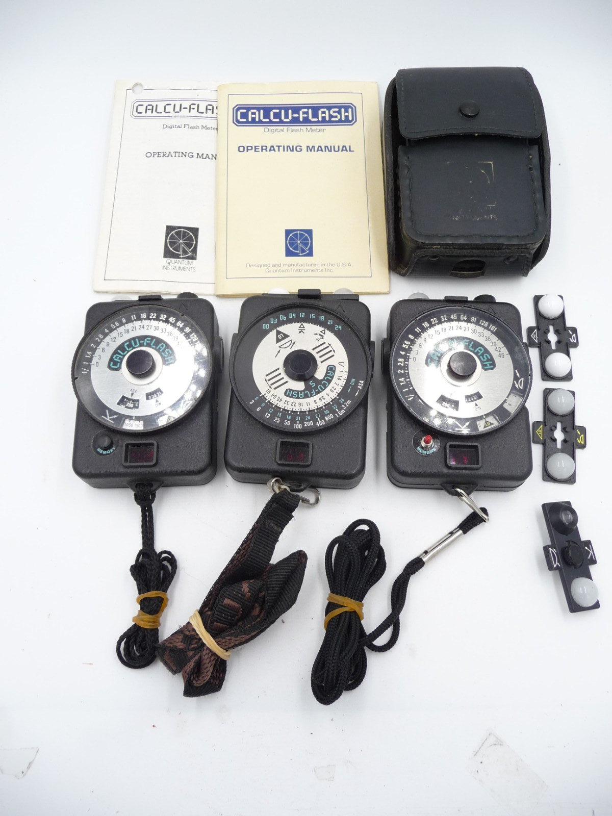 Lot of 3 Calcu-Flash meters, with manuals and one case, extra domes