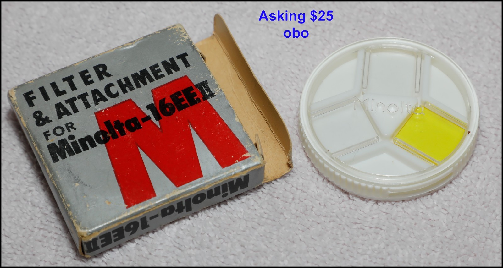 Yellow filter and UV filters for Minolta 16mm EE II in original box. Look unused