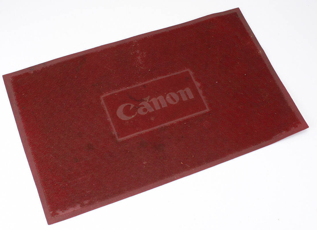 CANON DEALER COUNTER MAT, SOFT RUBBER, ROUGHLY 20 X 12 INCHES/194398