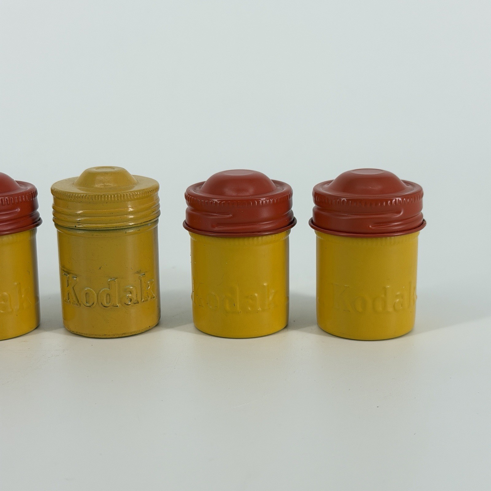 Lot of 7 Vintage Metal Kodak 35mm Film Canisters Yellow, Red, Silver