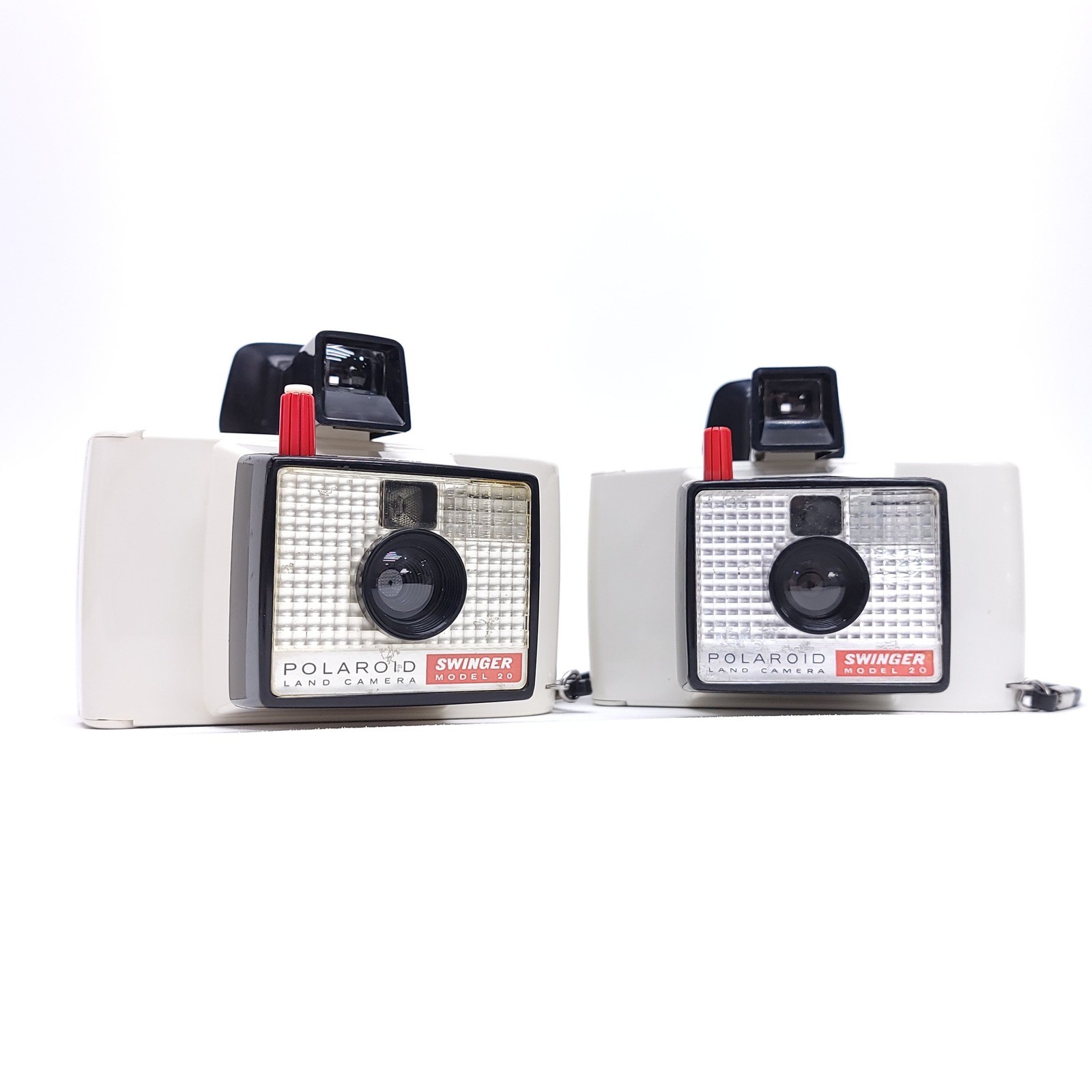 Vintage Pair of 60s Polaroid Land Camera Swinger Model 20 White