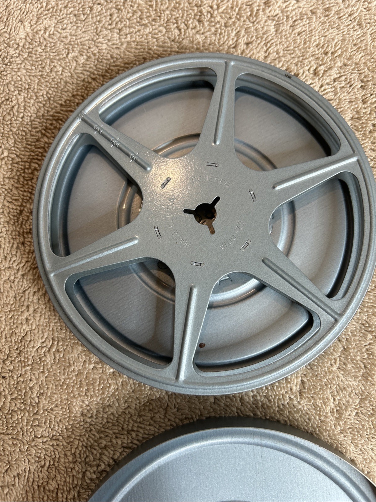 Two Vintage Stewart’s Anchorage Film Canisters In Grey With Mixed Reels 100-R07