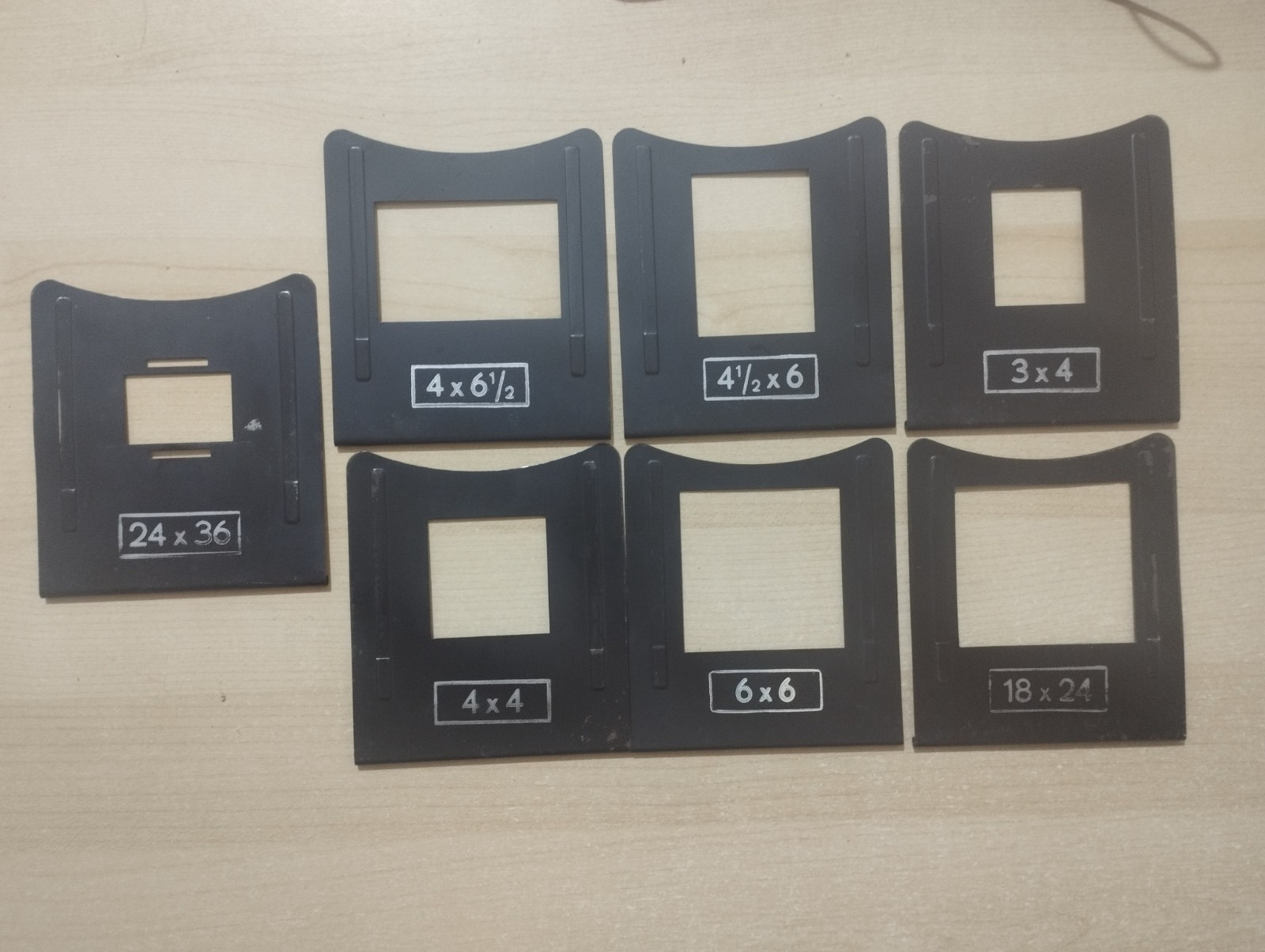 7 frames / masks in different sizes – see pictures. Used.