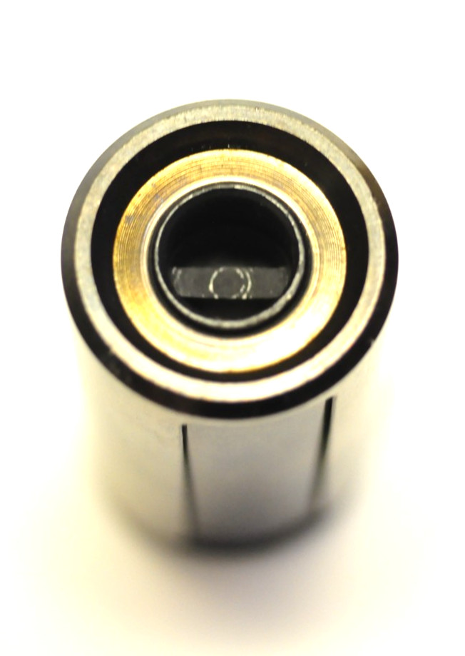 Canon 35mm reloadable film cassette as shown.