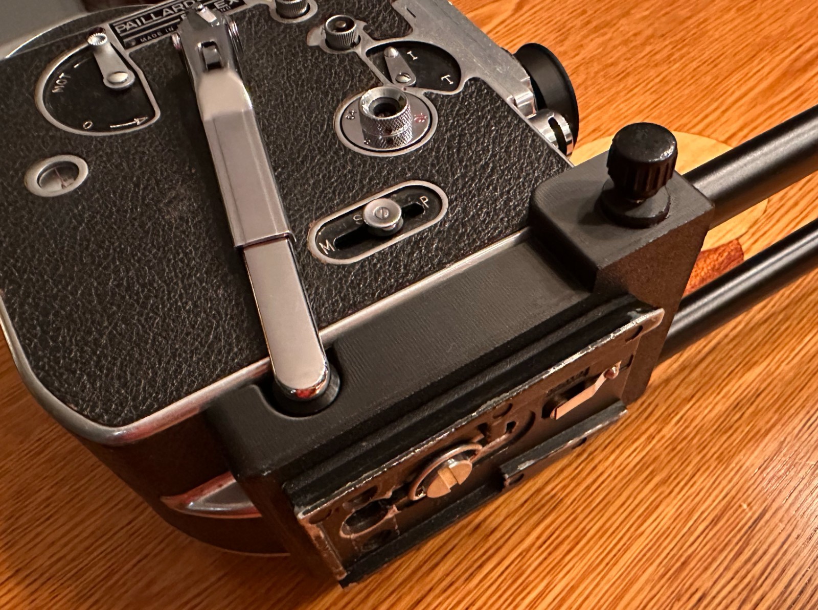 Bolex Saddle for 15mm Rods 60mm on Center – for “REX1 2 or 3” Round Base Cameras