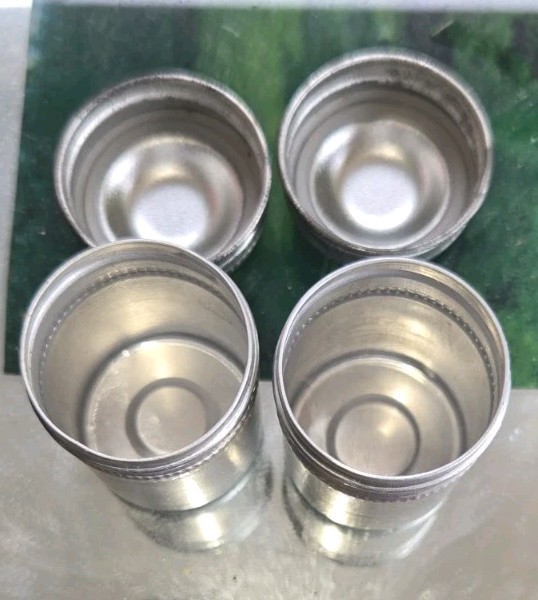 2 vintage aluminum film canisters