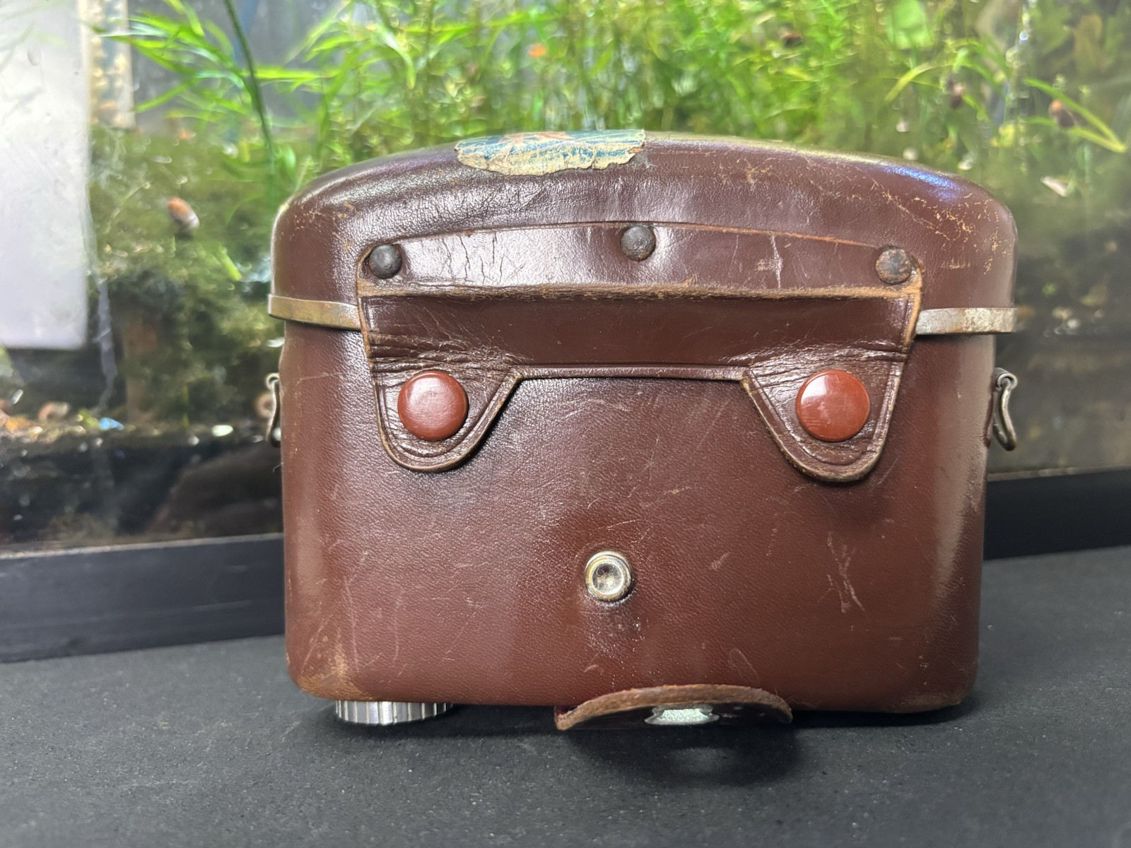 Vintage Brown Film Camera Case Made in Japan lots of wear and rust on metal.
