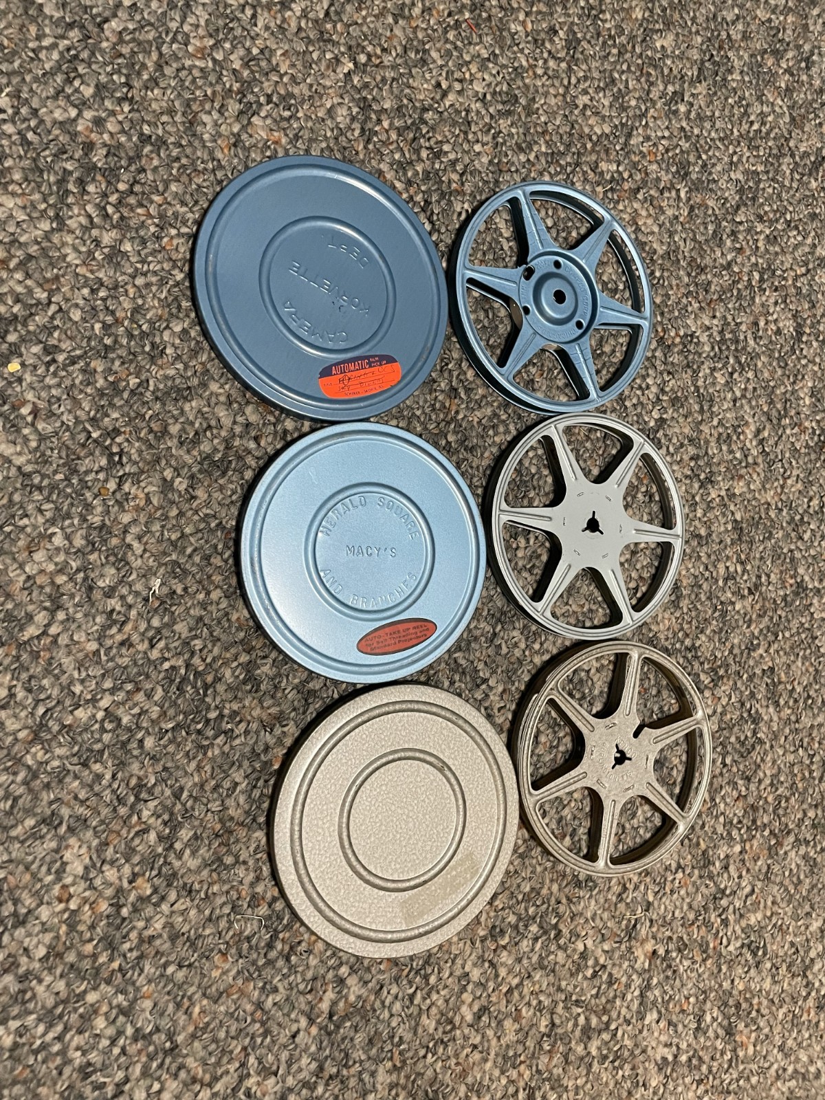 Three 200 feet Regular 8 metal movie reels with cans.