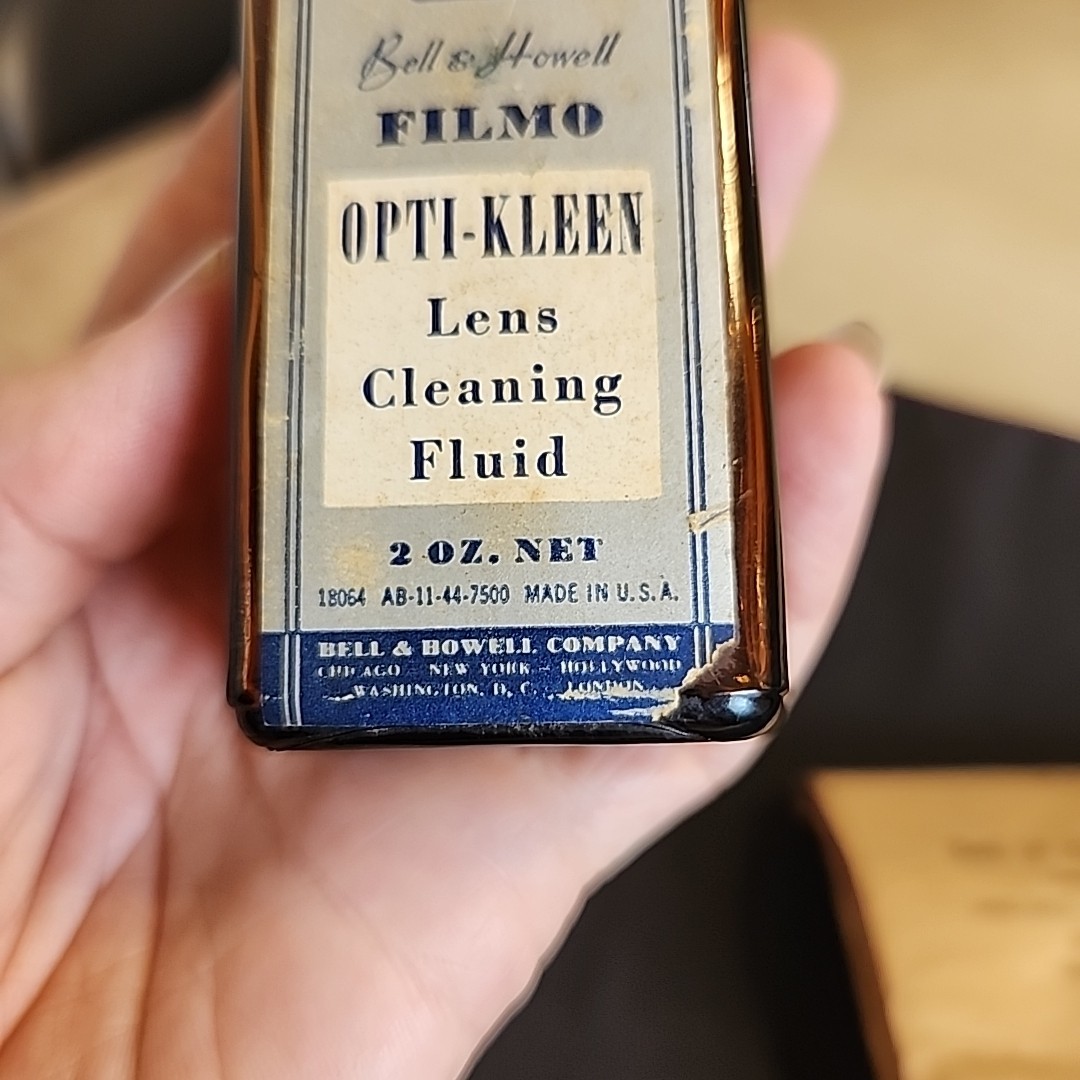 Vintage Bell & Howell Memorabilia Empty Bottle Of Opti-clean And Partial Tissue