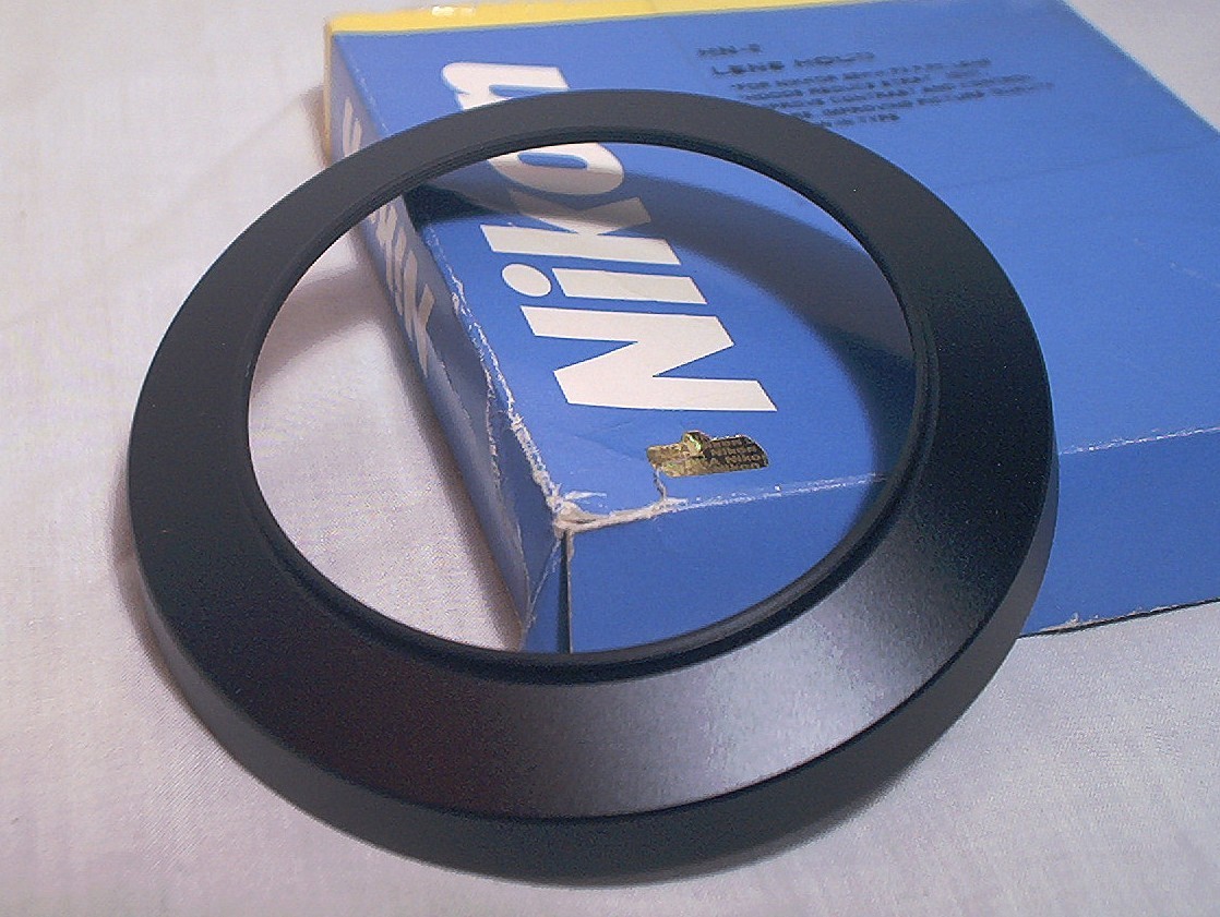 NIKON HN-9 SCREW ON TYPE LIGHT HOOD FOR 28MM & 20MM – UNUSED IN ORIGINAL BOX
