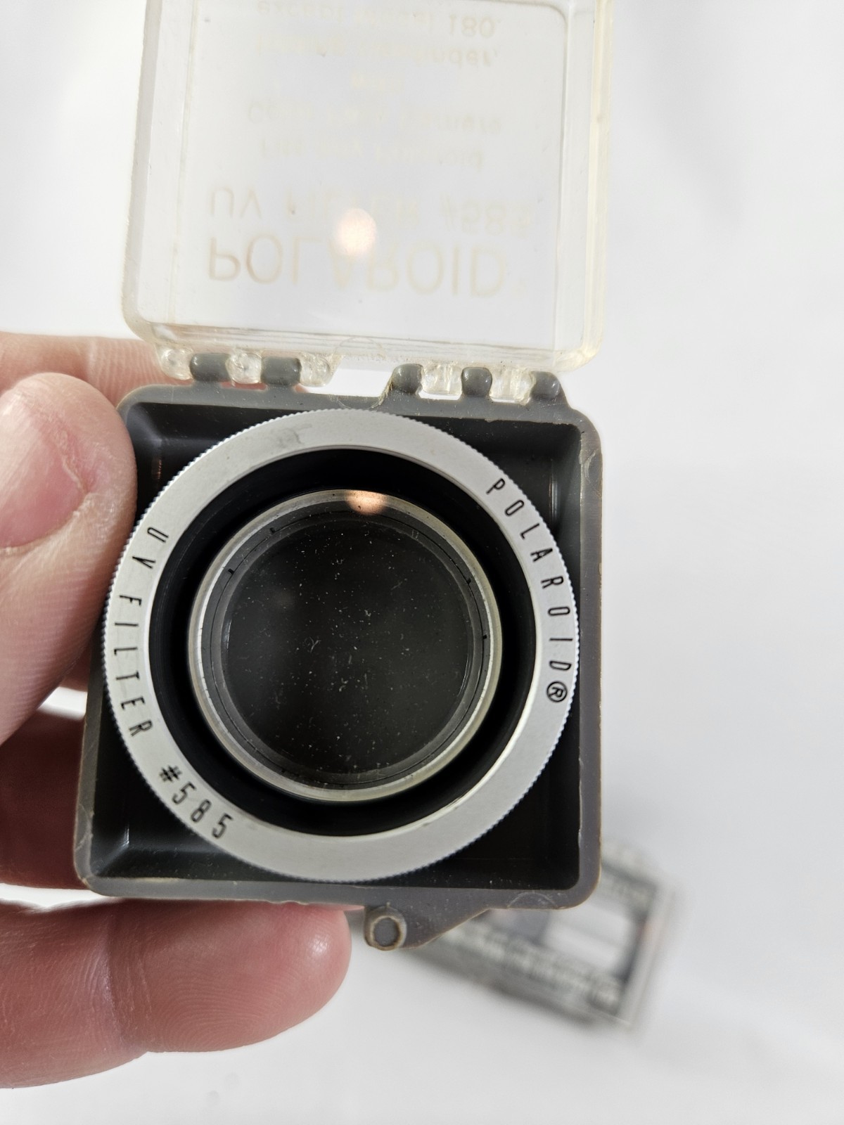 Polaroid Self-timer #192, Polaroid UV Filter #585, Portrait Lens #581 A