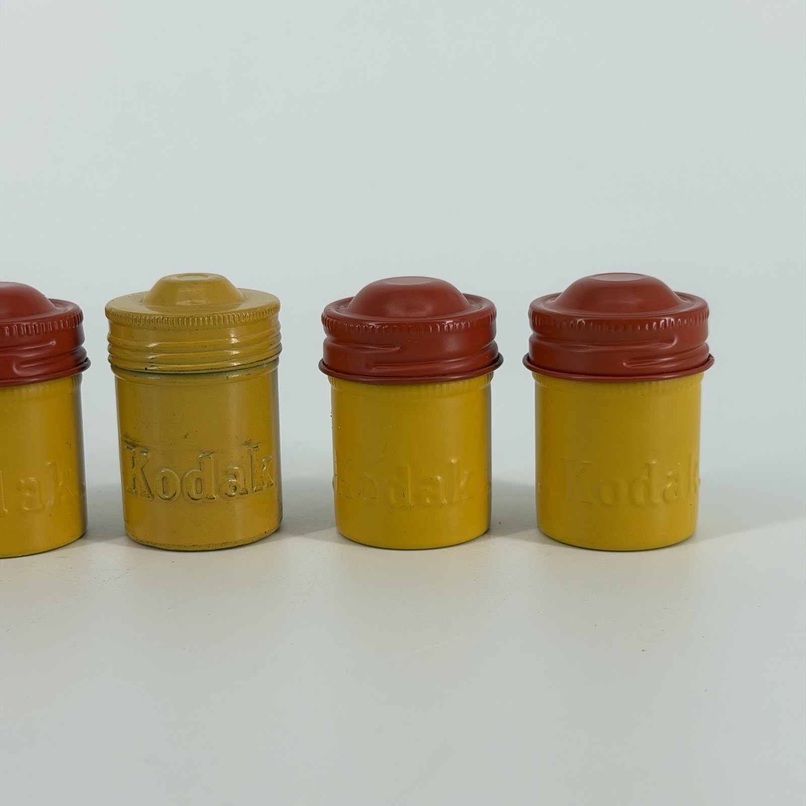 Lot of 7 Vintage Metal Kodak 35mm Film Canisters Yellow, Red, Silver