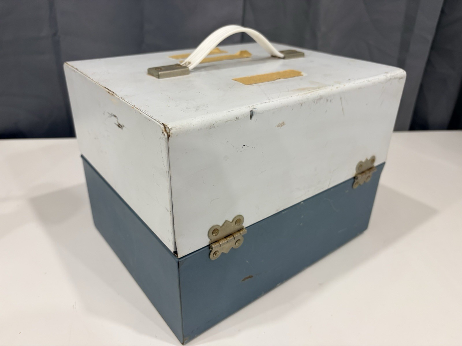 13 vintage 8mm film reels with 12 canisters and carrying case. No Film.