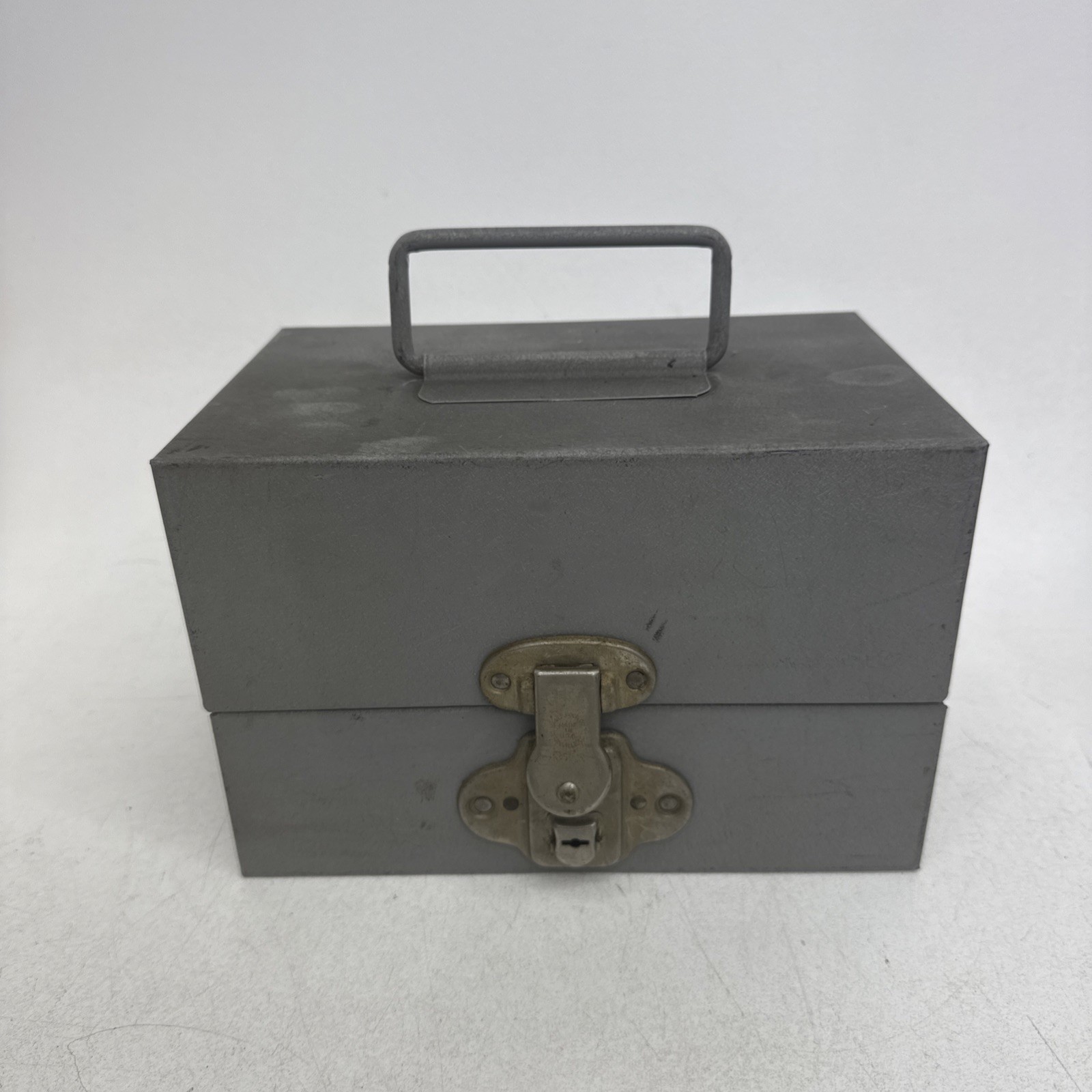 Brumberger Reel/Reel Metal Storage Case With 12 Empty Canisters