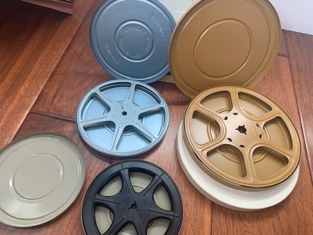 Lot of Vintage 7 Inch 8mm Metal and Plastic Film Reels, Cans, and Movies