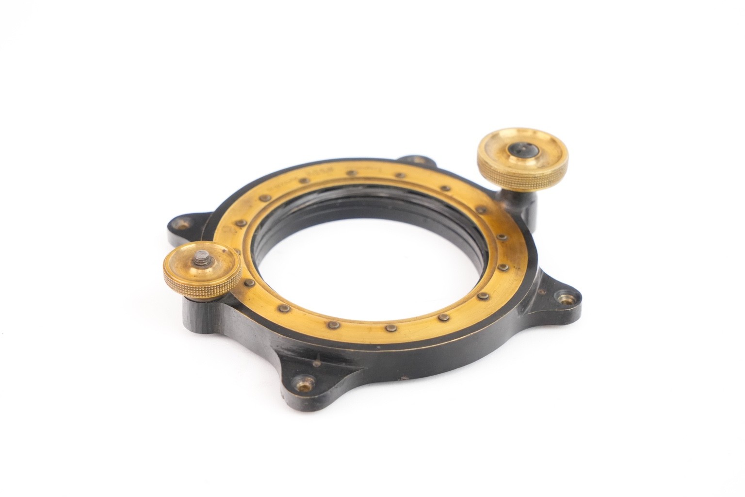Iris ring for photographic lens attachment. Circa 1900.