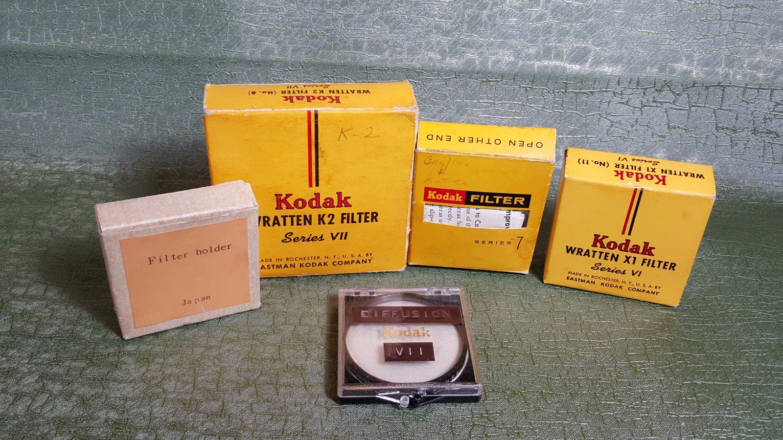 Set of 4 various filters and one filter holder. Kodak, Tiffen. Good condition