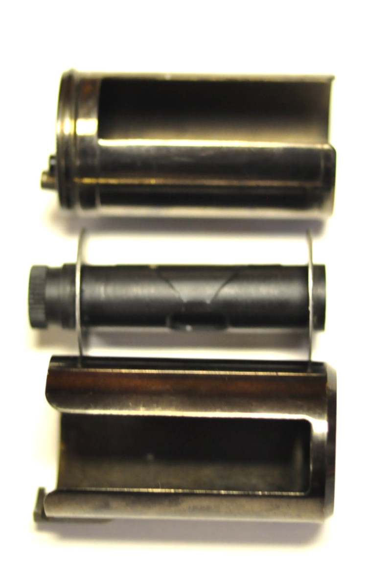 Canon 35mm reloadable film cassette as shown.