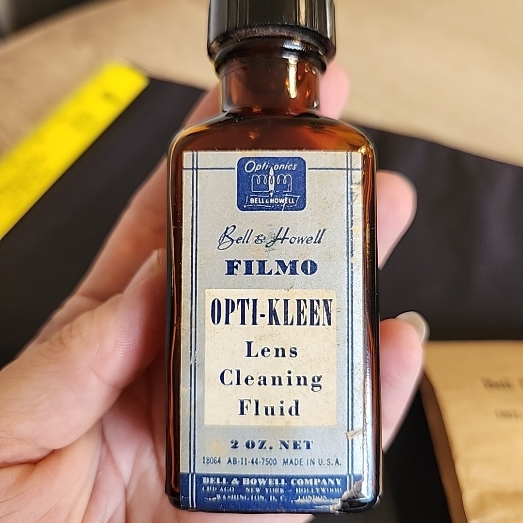 Vintage Bell & Howell Memorabilia Empty Bottle Of Opti-clean And Partial Tissue