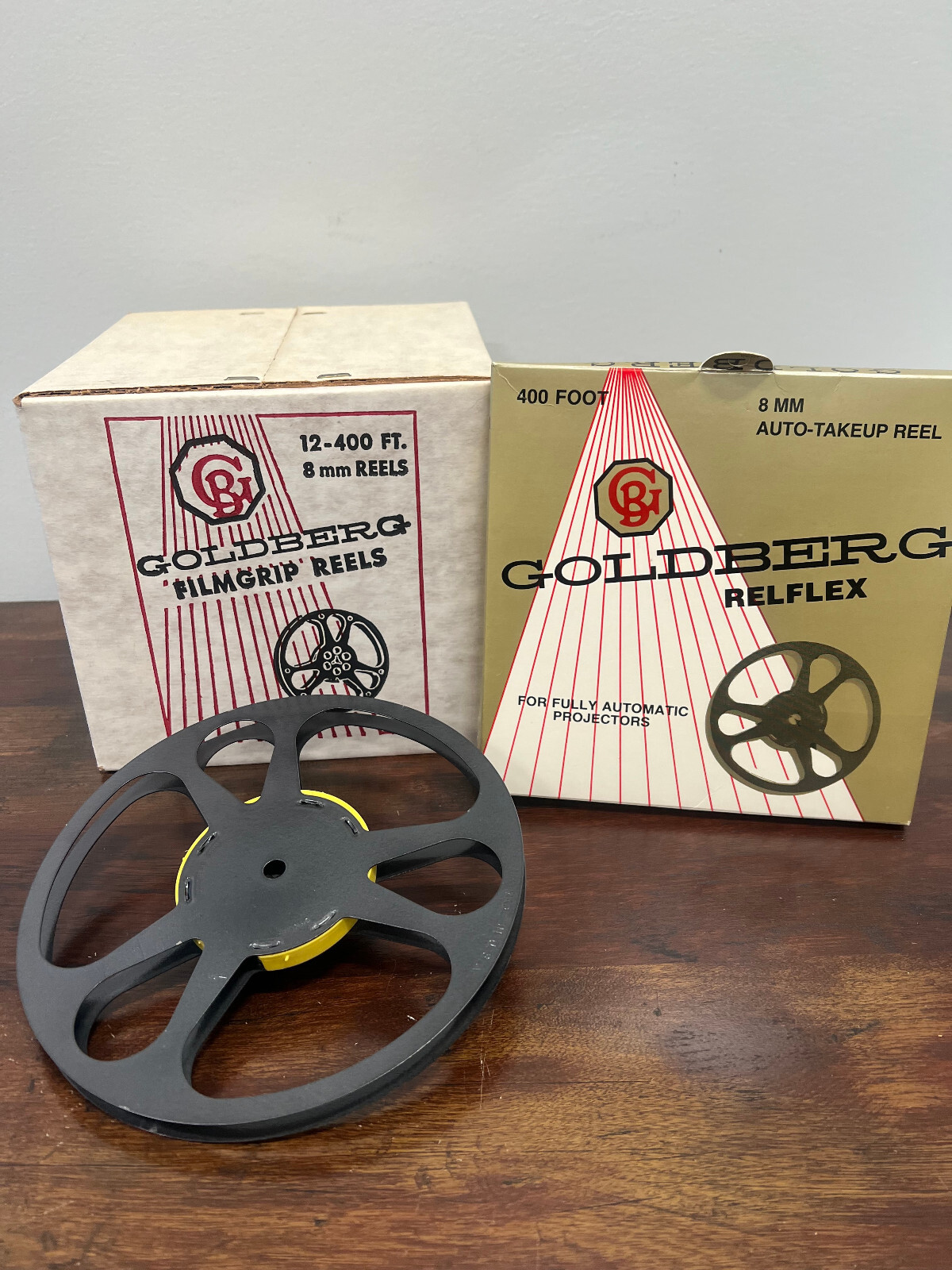 Lot of 12 Vintage Goldberg 8mm Relflex 400′ 7″ Film Reel & Box. New Old Stock