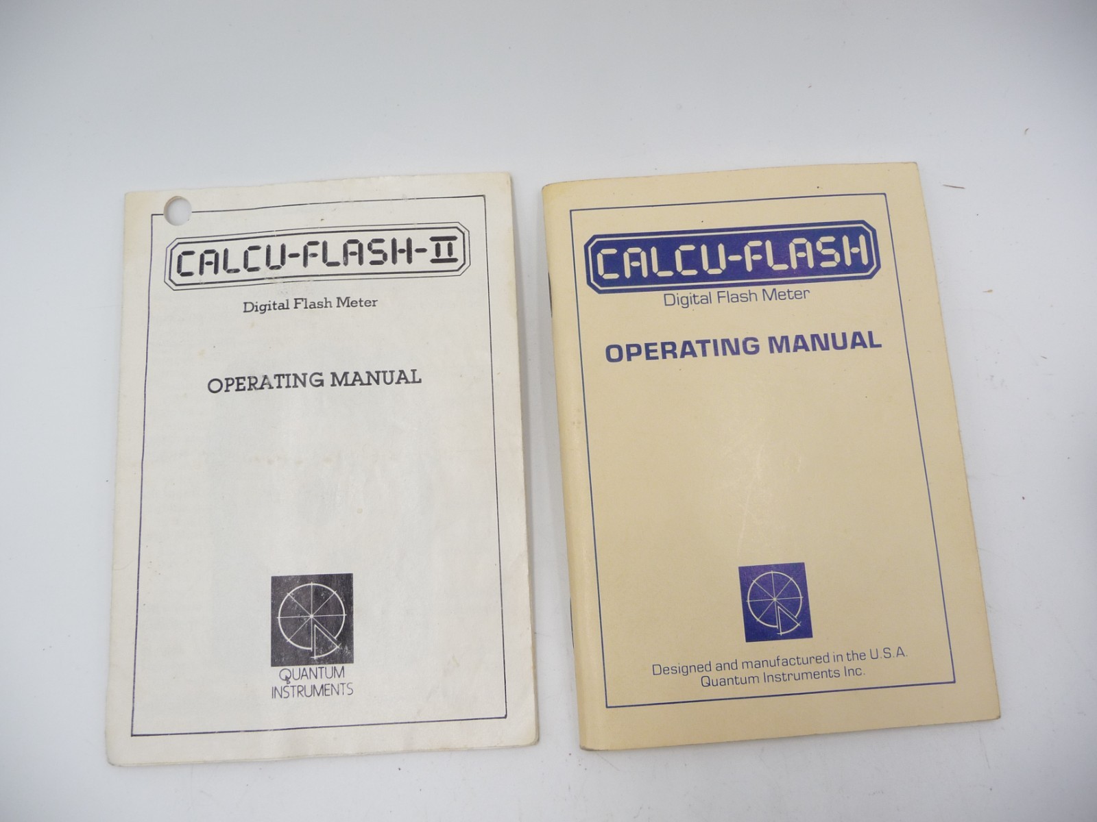 Lot of 3 Calcu-Flash meters, with manuals and one case, extra domes