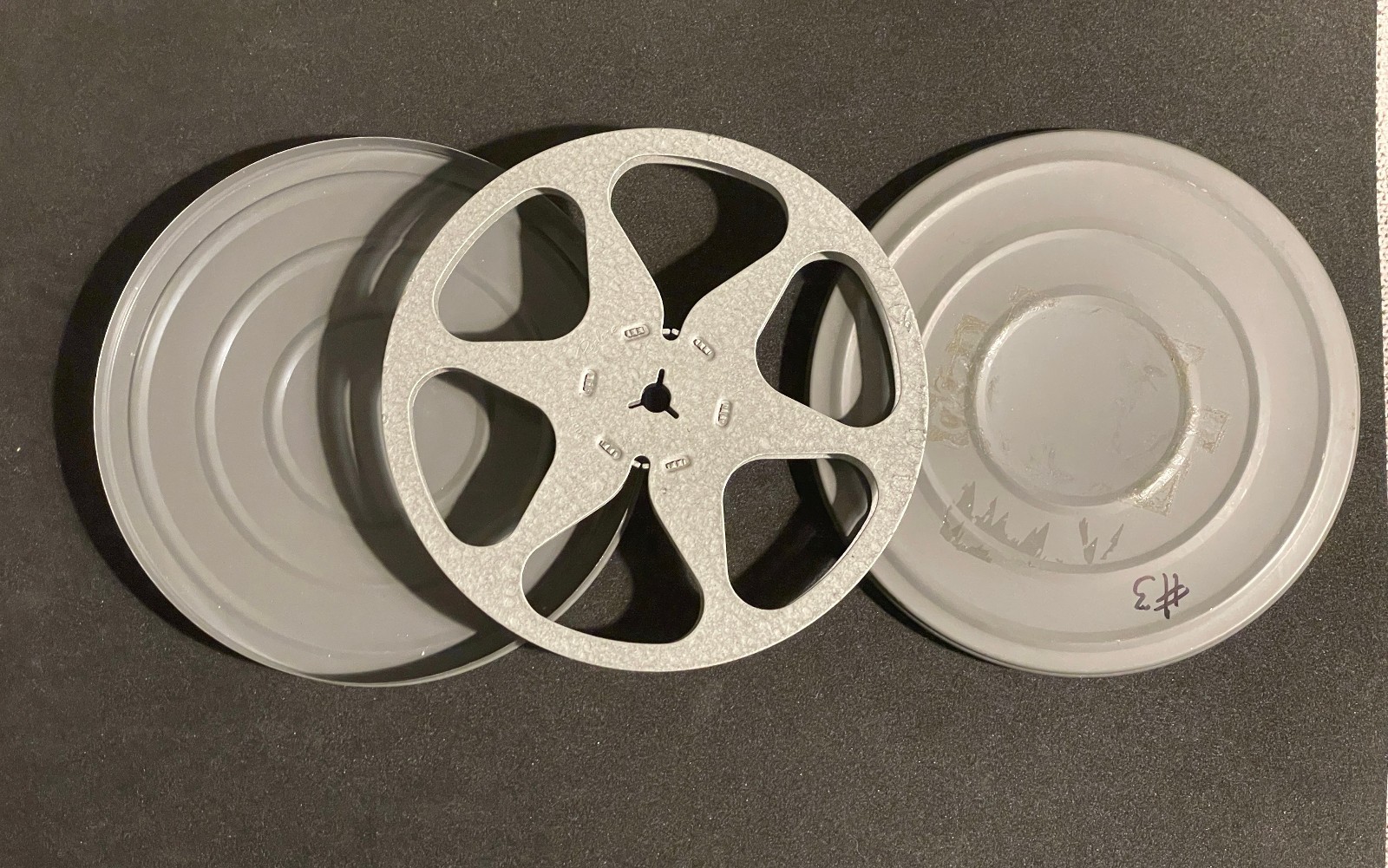 Lot Of 5 Vintage 7″ diameter 8mm Empty Film Reel Metal Cans + One Vintage Label