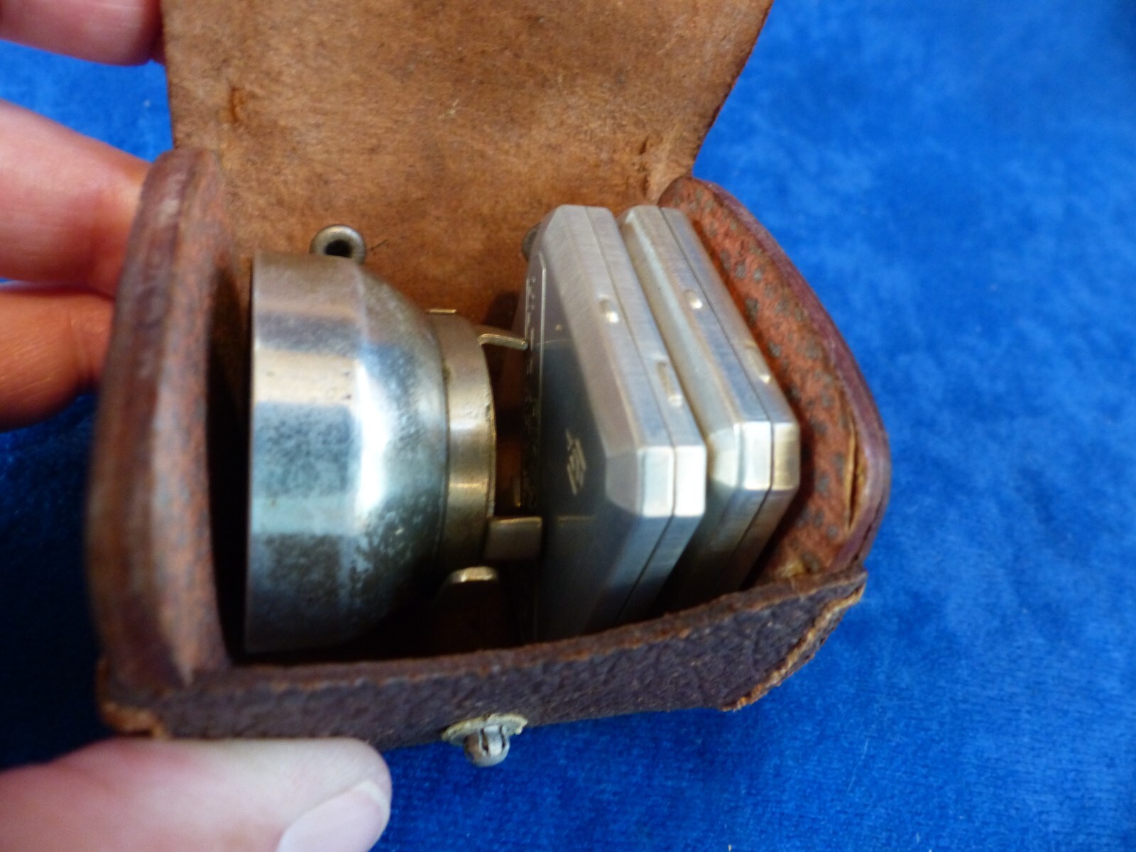Vintage Riken 25 mm filters in metal cases+clamp-on lens hood in leather case