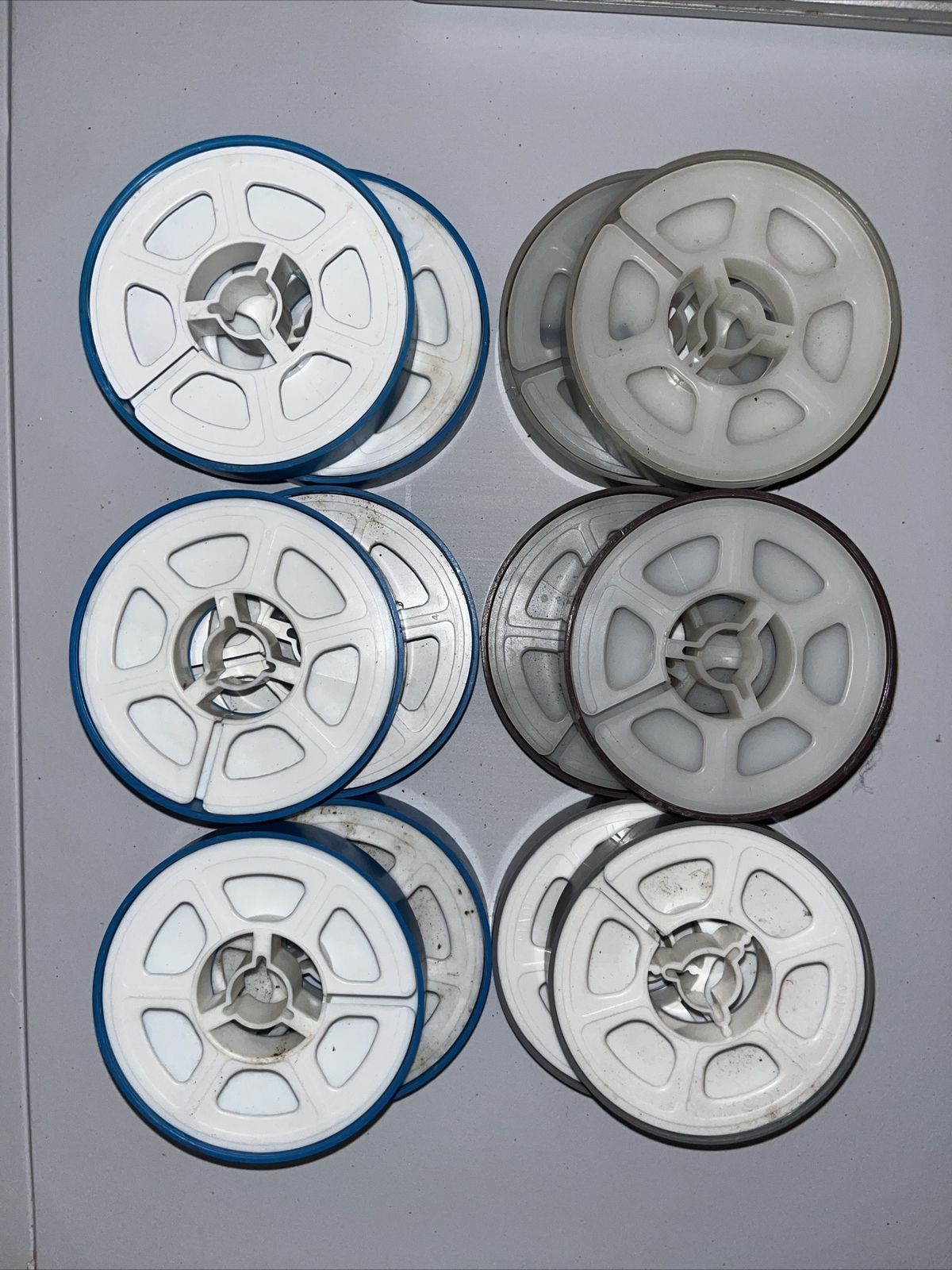 (12) 8mm Film Reels In Their Cases