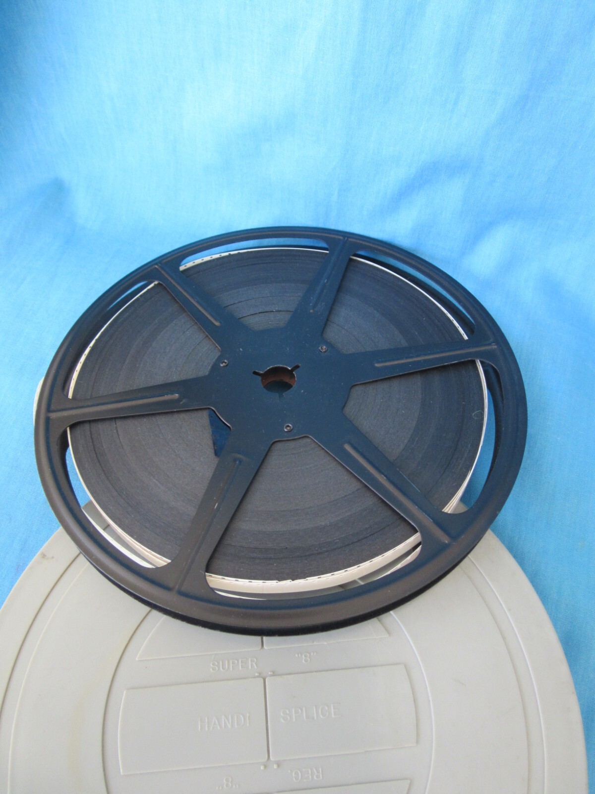 Super 8mm 400ft (7in) Movie Film Reel and Can with Amateur Movies