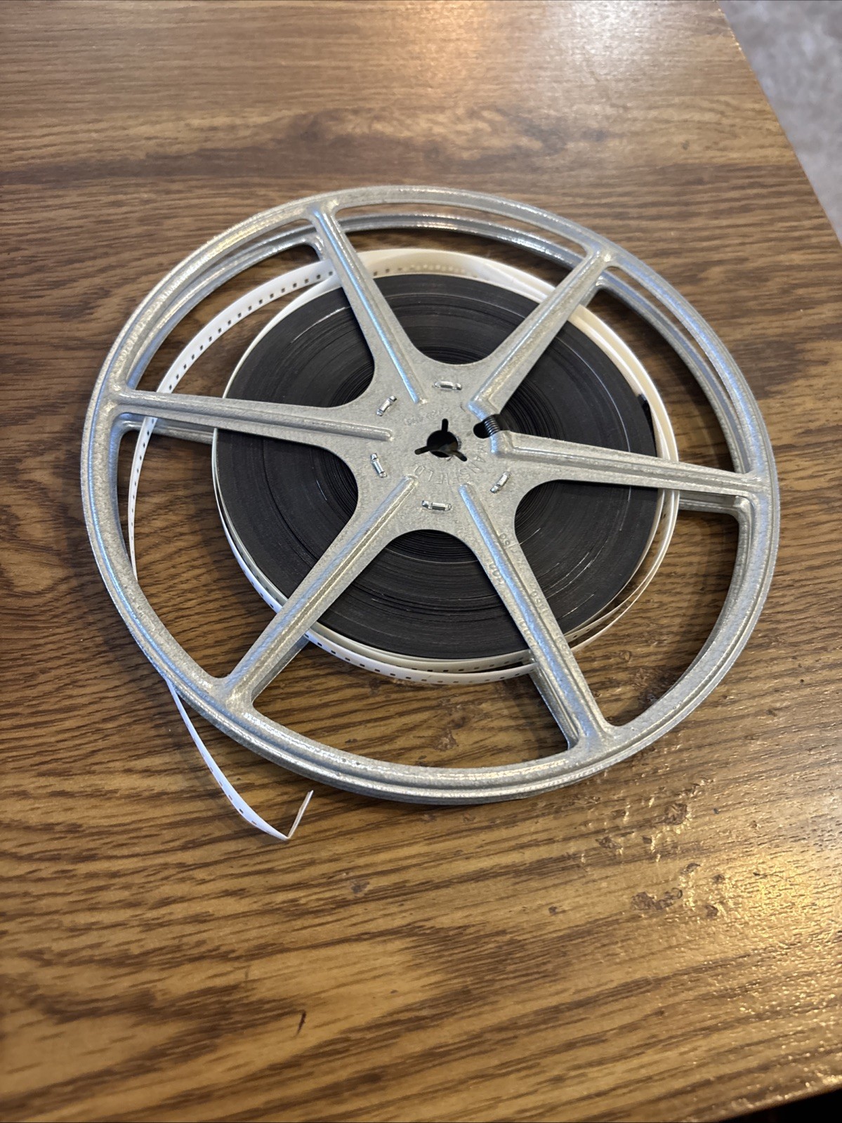 Clark’s Drugs Canoga Park Camera Department Film can 7-1/4 and Mansfield Reel &