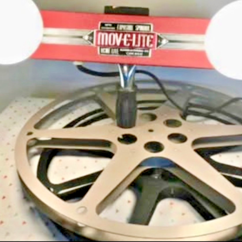 Vintage handheld Move-E-Lite movie/photography light spin dial exposure