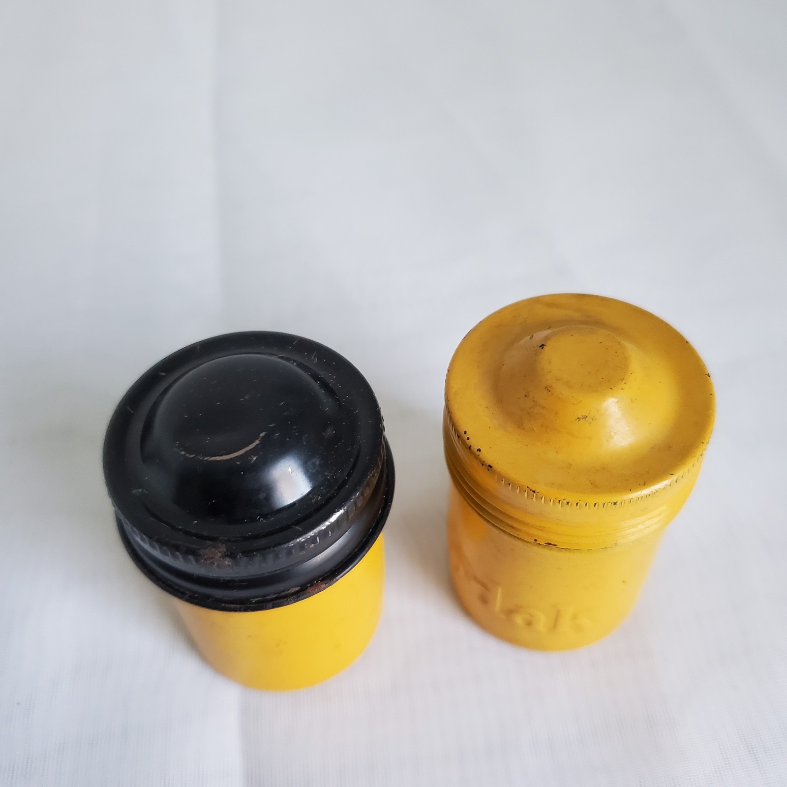 Lot of 2 Kodak Black Yellow Embossed Metal Film Roll Containers