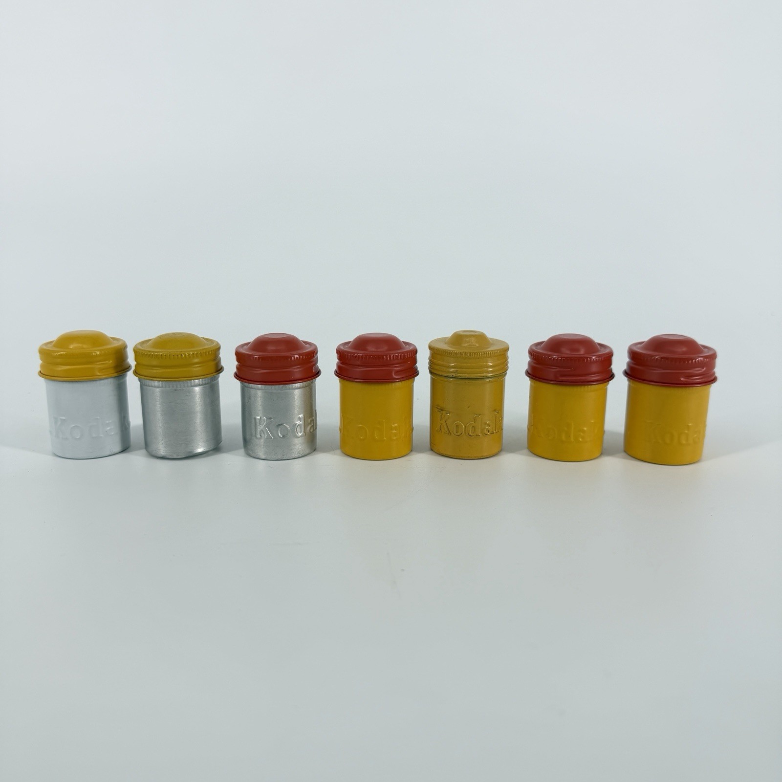 Lot of 7 Vintage Metal Kodak 35mm Film Canisters Yellow, Red, Silver