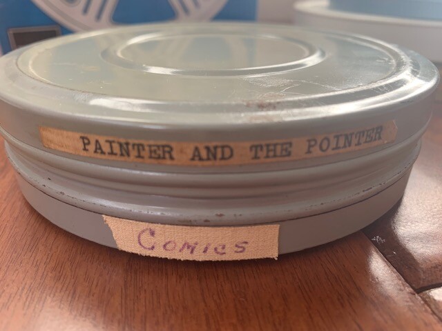 Lot of Vintage 7 Inch 8mm Metal and Plastic Film Reels, Cans, and Movies