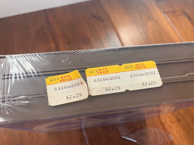 Lot of Vintage 7 Inch 8mm Metal and Plastic Film Reels, Cans, and Movies