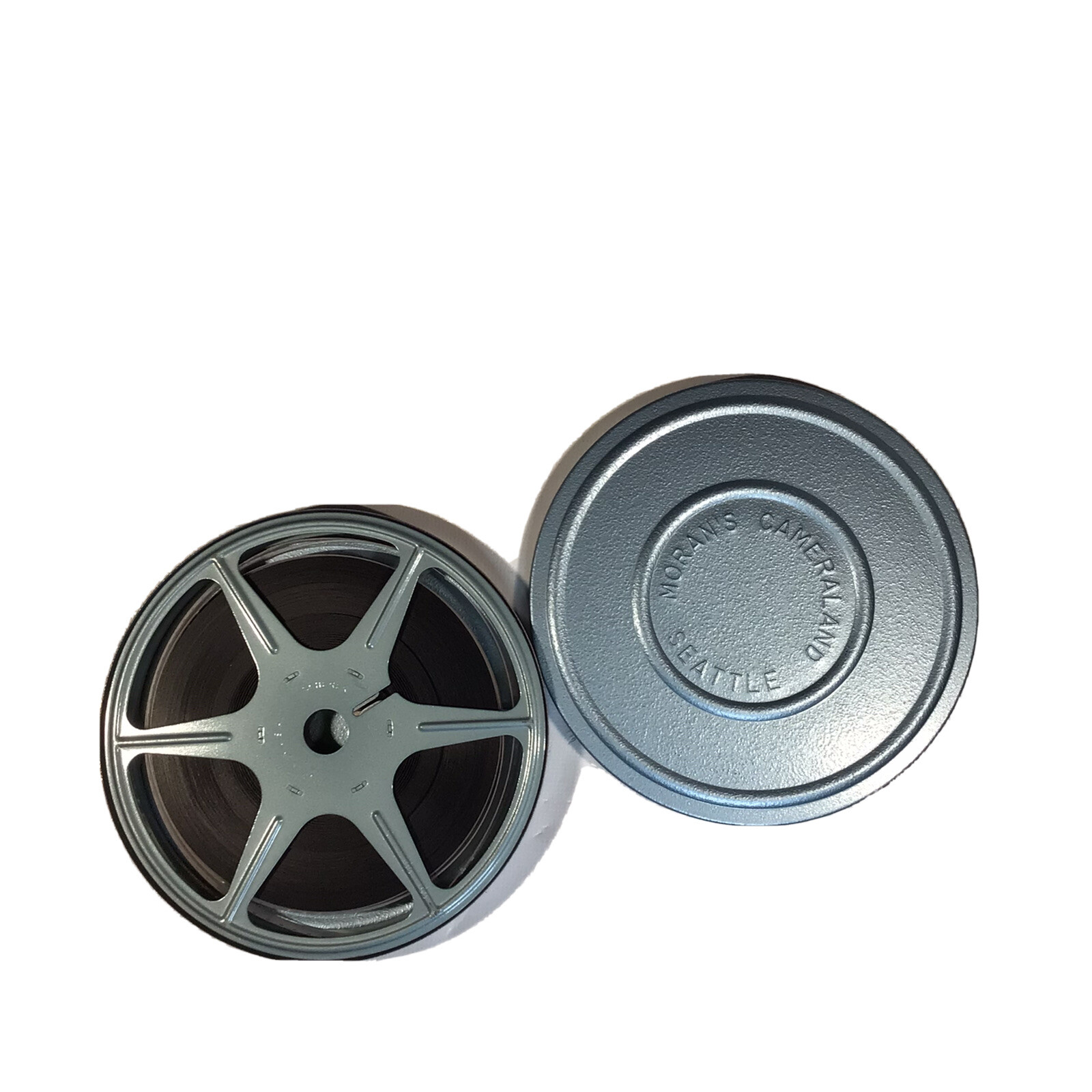 VINTAGE MORAN’S CAMERALAND SEATTLE MOVIE CANISTER & REEL WITH MOVIE COLLECTIBLE