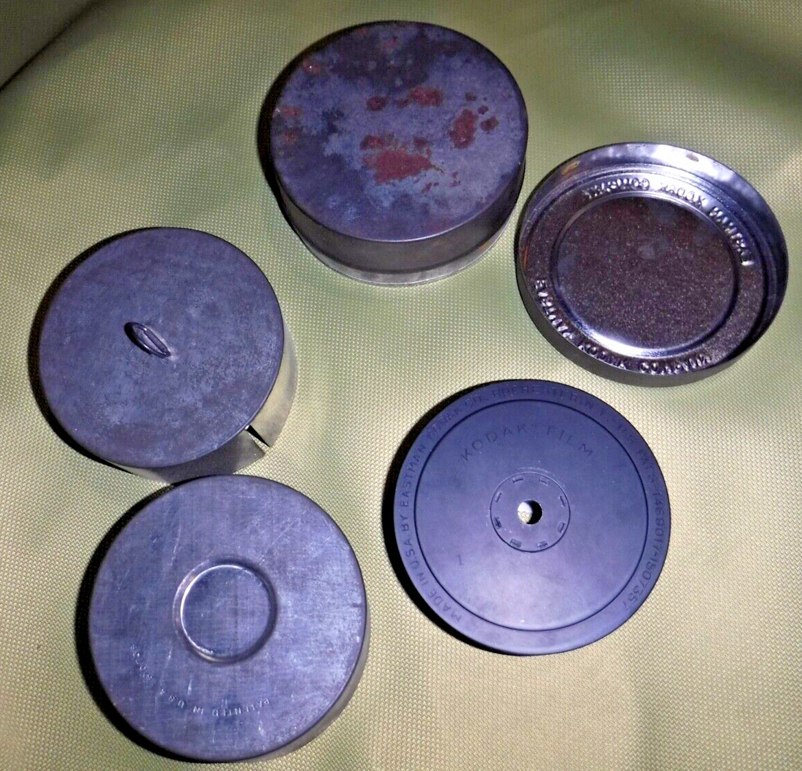 EASTMAN KODAK CO 2 VINTAGE TINS CONTAINERS AND 1 METAL REEL