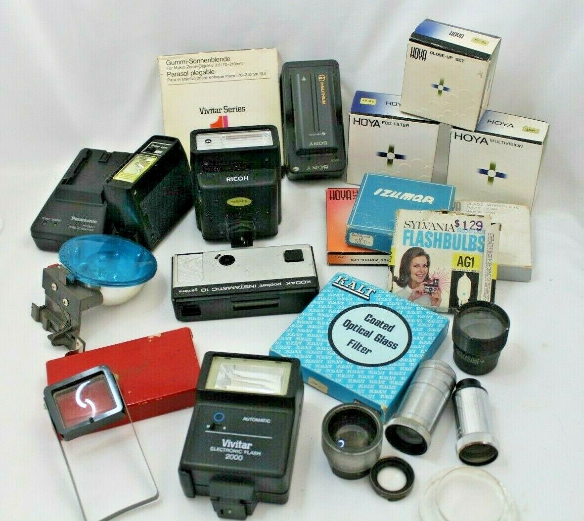 LOT OF VINTAGE CAMERA FILTERS, LENS, FLASHES AND ACCESSORIES -A