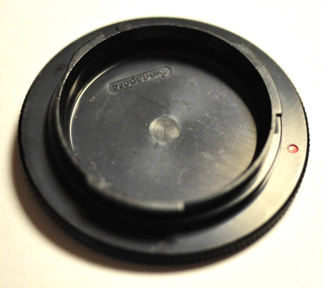 Original Rollei plastic bayonet body cap for their 35mm camera.