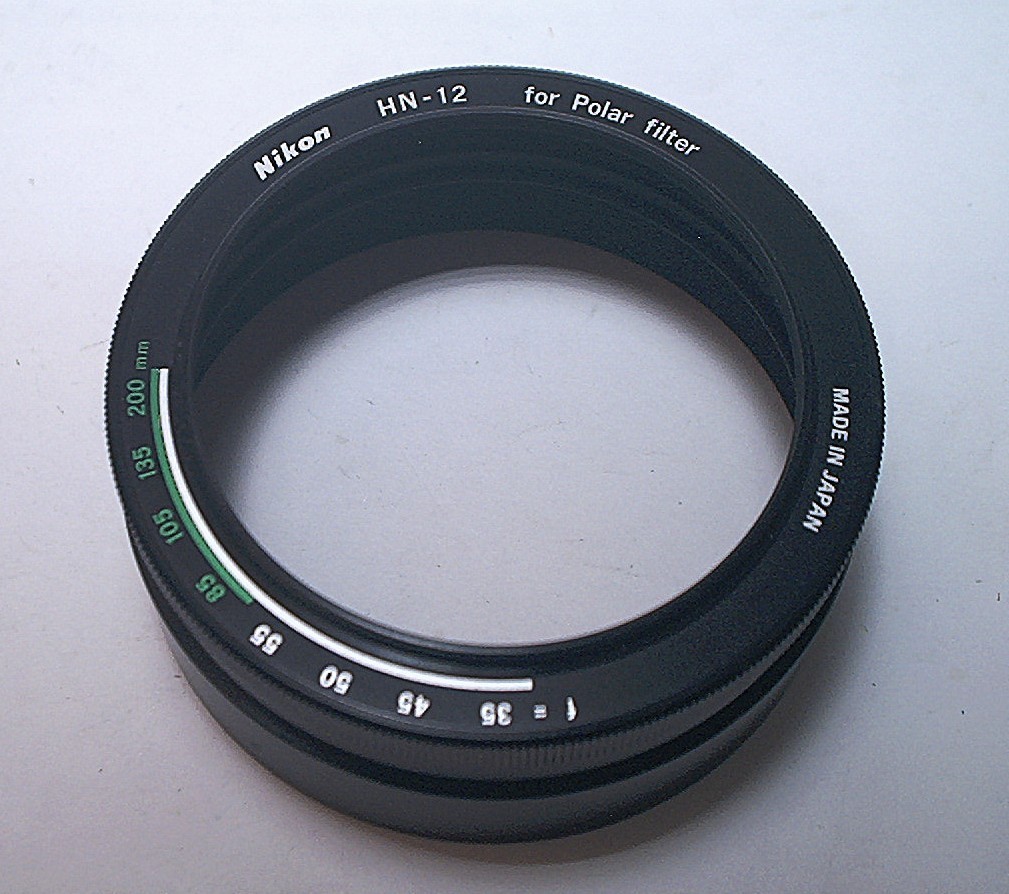 NIKON SCREW ON TYPE LIGHT HOOD FOR POLARIZING FILTER – UNUSED IN ORIGINAL BOX