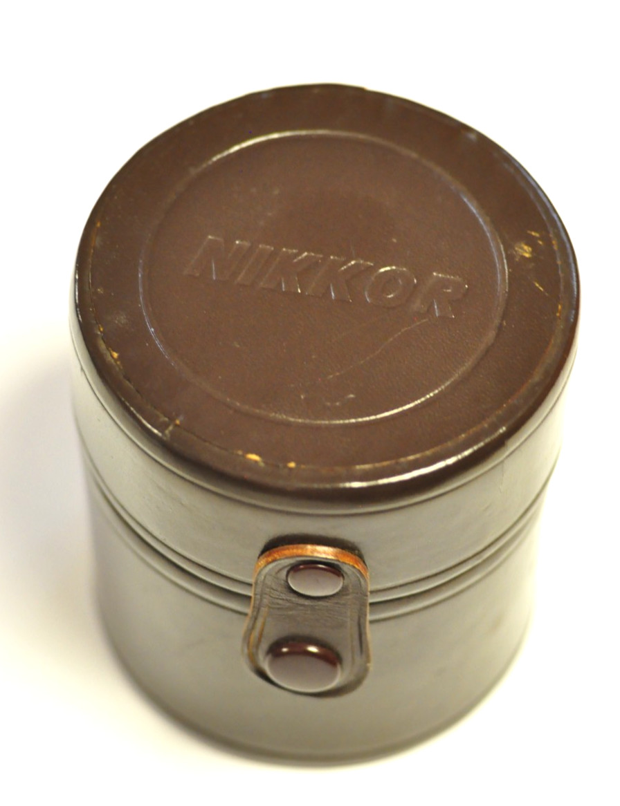 Nikon Nikkor brown leather lens case. Outside dim. 3 3/8″ D x 3 3/4″ H. READ.