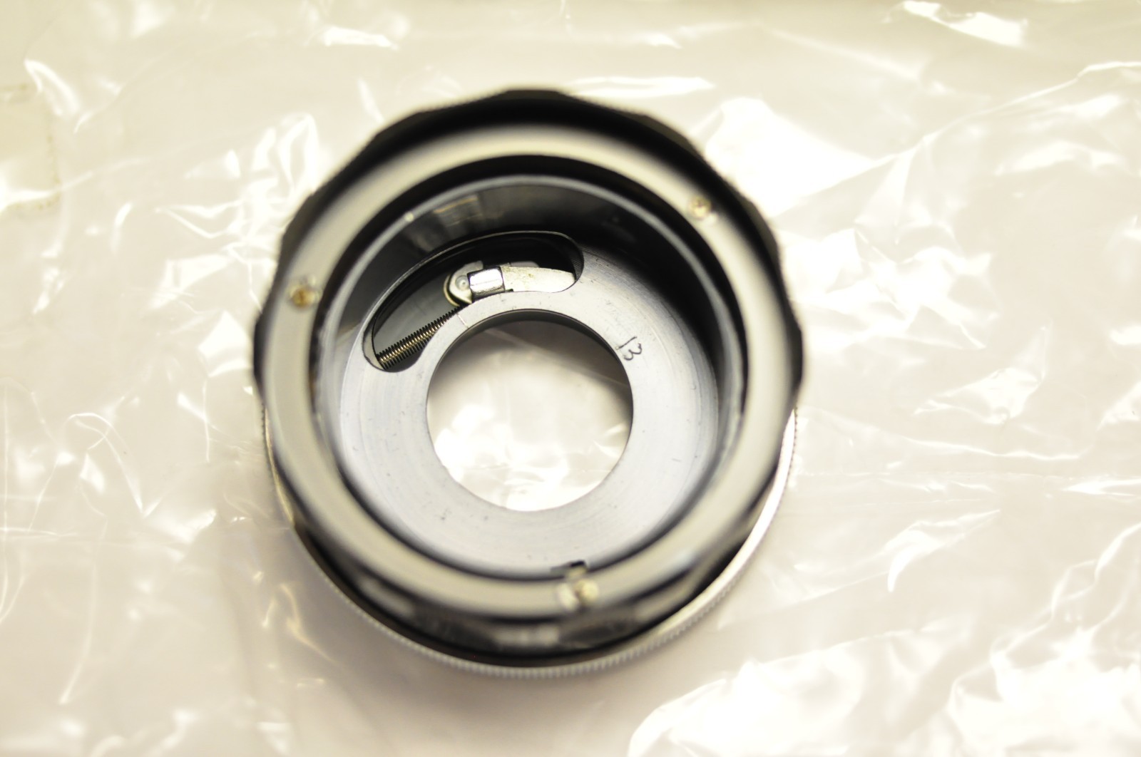 Canon helicoid assembly for their 35mm f2.5 FL lens. NEW OLD STOCK