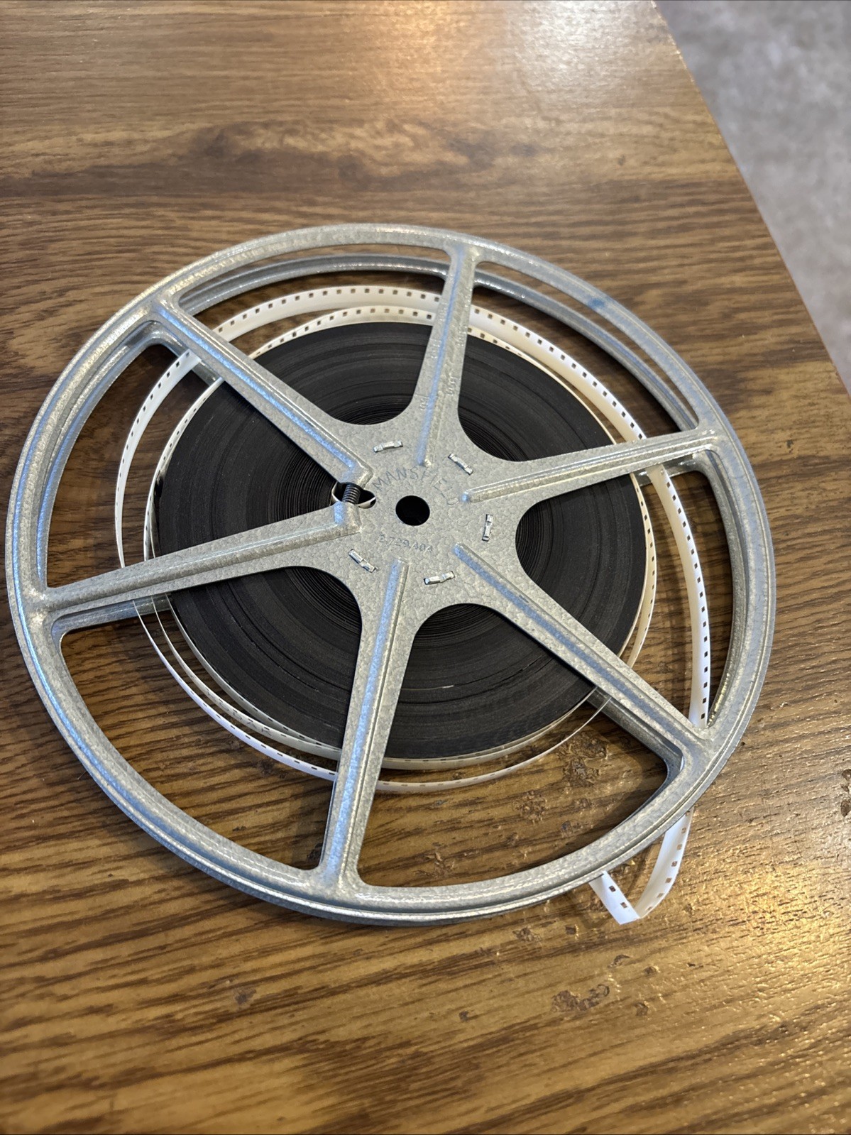 Clark’s Drugs Canoga Park Camera Department Film can 7-1/4 and Mansfield Reel &