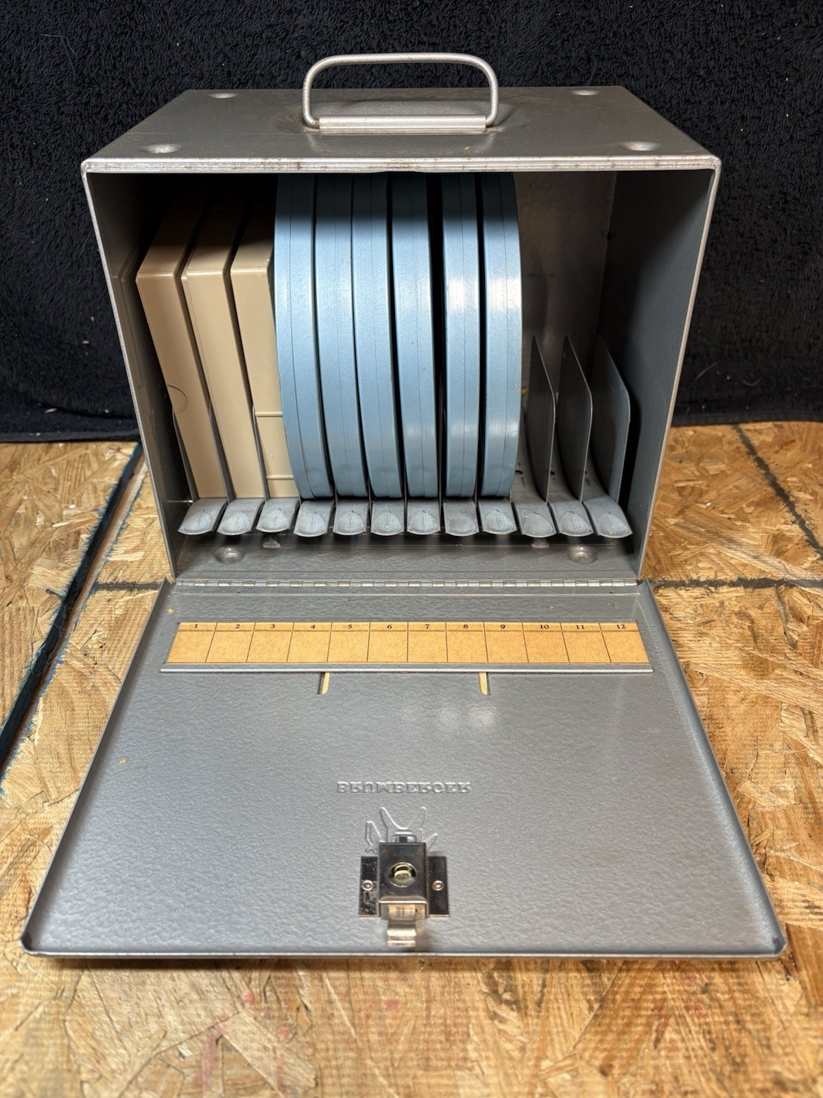 Vintage Brumberger 7” Film Metal Reel Box With Four 1940-50’s 8mm Movies
