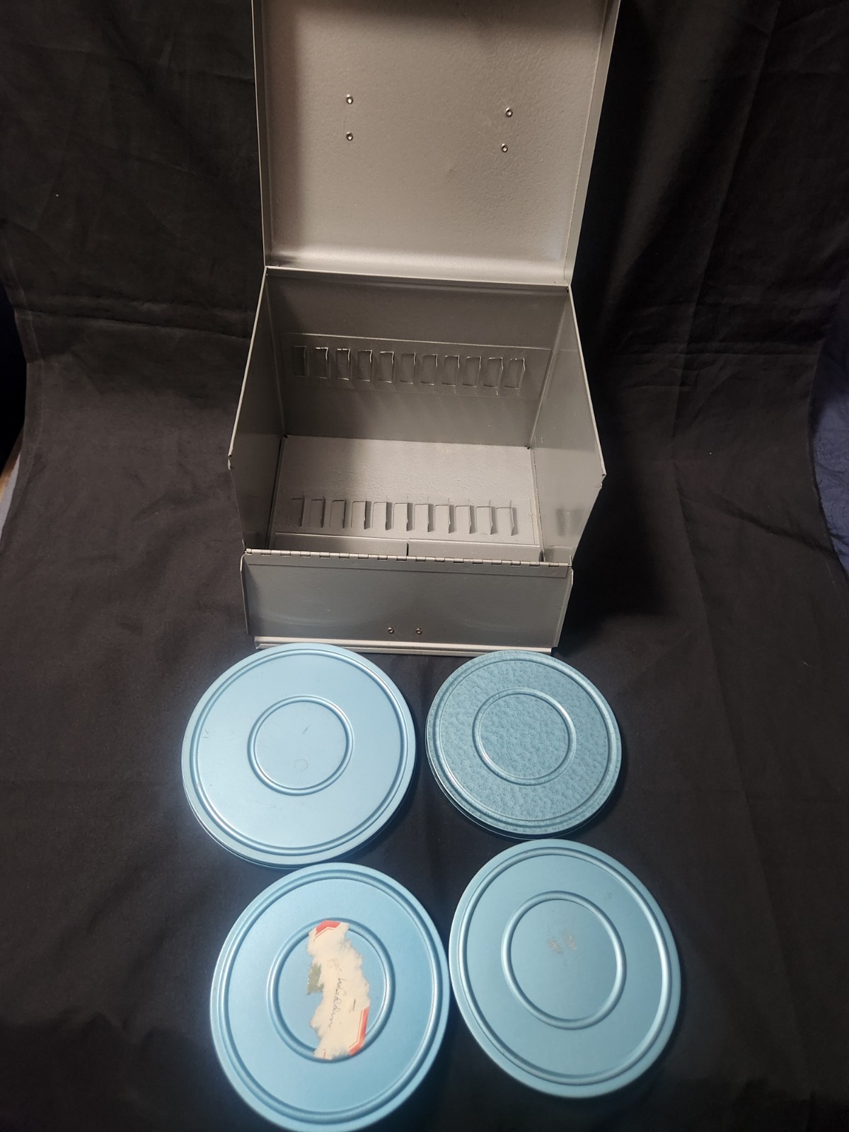 Vintage 8mm Movie Reel Metal Storage Box 12 Slots With Four 8 MM Cases Bruce