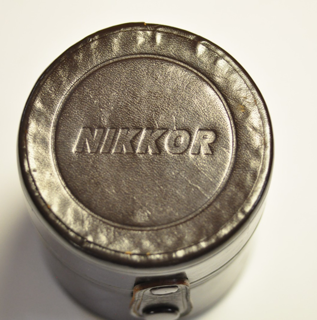 Nikon Nikkor brown leather lens case. Outside dim. 3 3/8″ D x 3 3/4″ H. READ.
