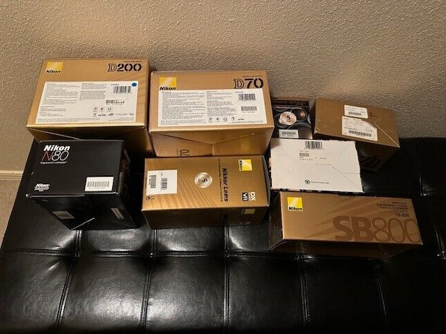 ASSORTMENT OF 8 NIKON CAMERAS, LENS & FLASH BOXES (ONLY)