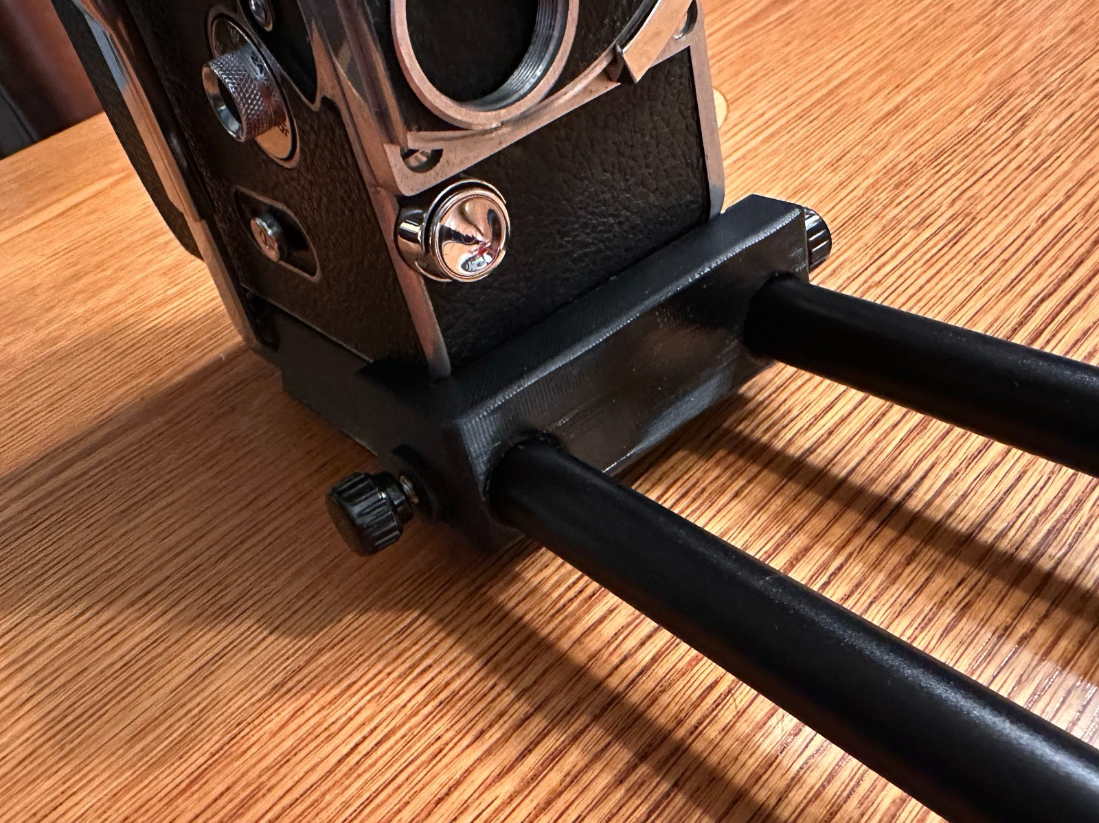 Bolex Saddle for 15mm Rods 60mm on Center – for “REX1 2 or 3” Round Base Cameras
