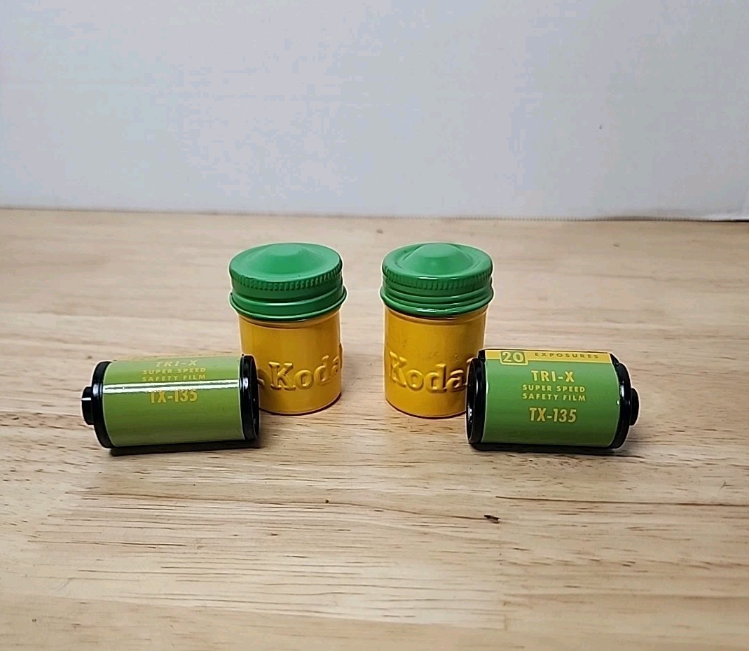 VTG Kodak Empty Embossed Metal Film Canisters With Empty Tri-X Film Rolls